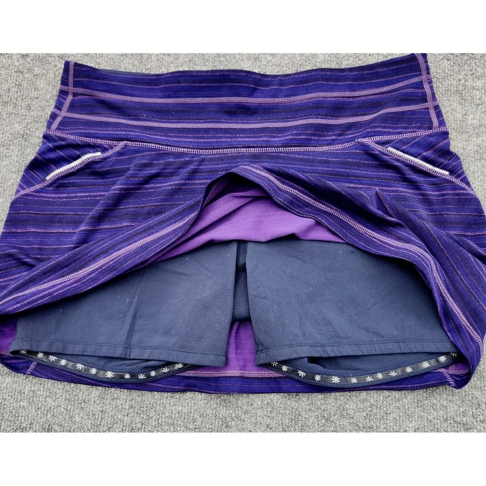 ATHLETA women's SKORT skirt‎ Relay Striped PURPLE golf tennis pickleball Size L